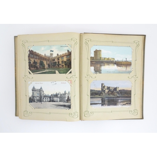 2139 - A 20thC postcard album to include various Royal residences, country houses and palaces to include Wi... 