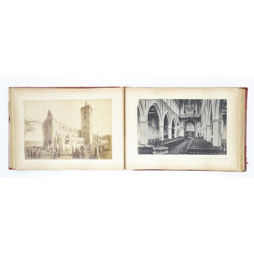 2146 - A Victorian photograph album containing various views to include Lincoln Cathedral, Dairy Bridge Rok... 