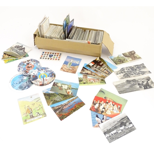 2150 - A large quantity of 20thC picture postcards to include church interiors, trains / locomotives, birds... 