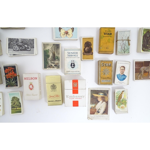 2155 - A large quantity of assorted 20thC cigarette and tea cards to include examples from Will's Cigarette... 