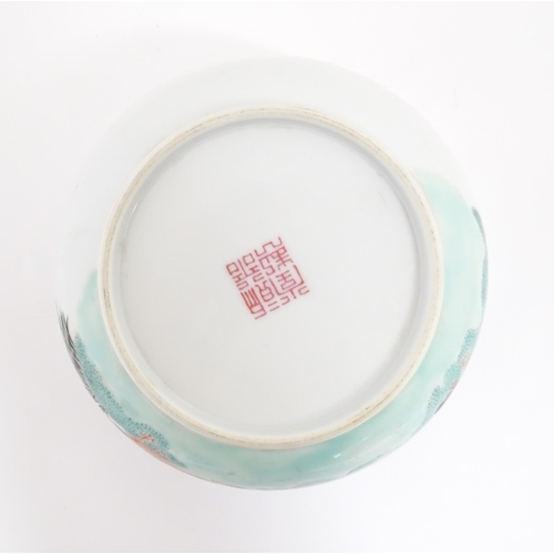 38 - A Chinese bowl decorated with geese in a landscape. Character marks under. Approx. 2 3/4