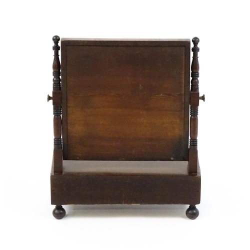 1676 - A 19thC mahogany toilet mirror with a square mirror raised on turned supports with satinwood banding... 