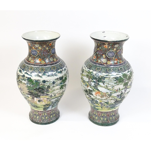 52 - A pair of large Chinese famille verte vases decorated with farming scenes with figures harvesting fi... 