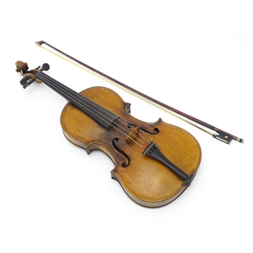 1290 - Musical instrument : a 19thC violin, bearing hand-written interior label ' John Betts - No 2 - Rear ... 