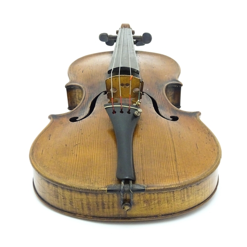 1290 - Musical instrument : a 19thC violin, bearing hand-written interior label ' John Betts - No 2 - Rear ... 