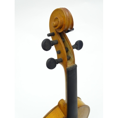 1291 - Musical Instrument : a 20thC violin , bearing interior label ' Sebastien Kloz - An 1700 ', together ... 