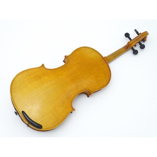 1291 - Musical Instrument : a 20thC violin , bearing interior label ' Sebastien Kloz - An 1700 ', together ... 