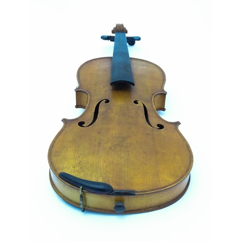 1291 - Musical Instrument : a 20thC violin , bearing interior label ' Sebastien Kloz - An 1700 ', together ... 