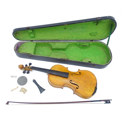 1291 - Musical Instrument : a 20thC violin , bearing interior label ' Sebastien Kloz - An 1700 ', together ... 