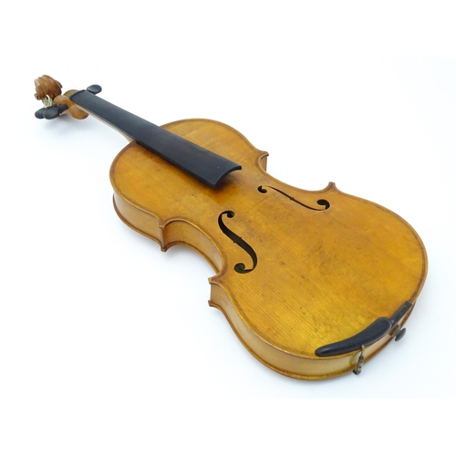 1291 - Musical Instrument : a 20thC violin , bearing interior label ' Sebastien Kloz - An 1700 ', together ... 