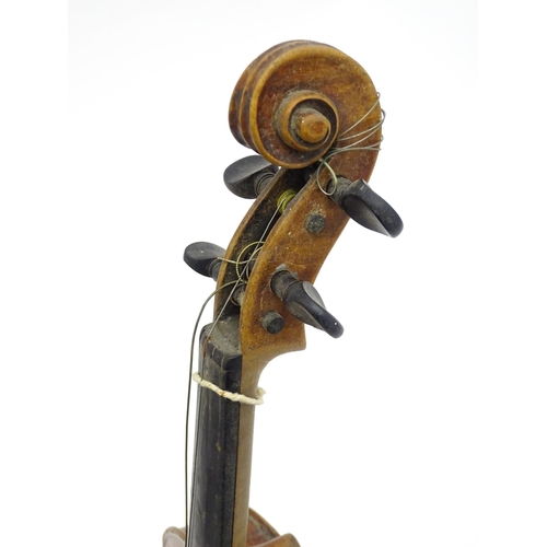 1292 - Musical Instruments : a late 19thC German violin, bearing interior label 'Nach (Joseph Guarnerius Cr... 