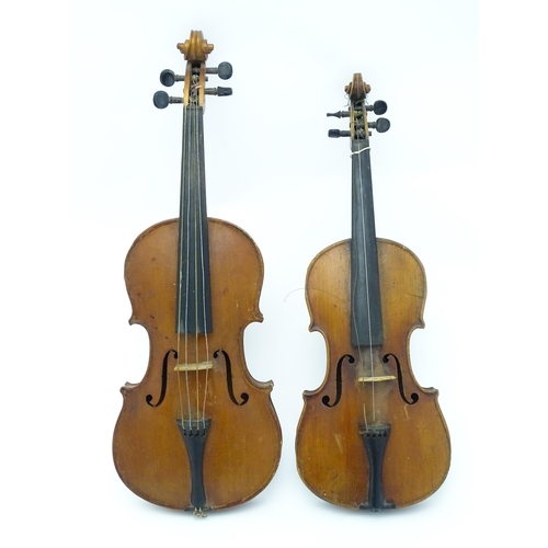 1292 - Musical Instruments : a late 19thC German violin, bearing interior label 'Nach (Joseph Guarnerius Cr... 