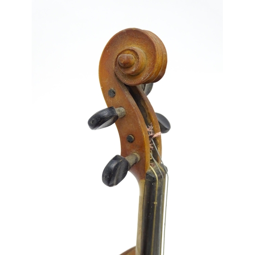 1292 - Musical Instruments : a late 19thC German violin, bearing interior label 'Nach (Joseph Guarnerius Cr... 