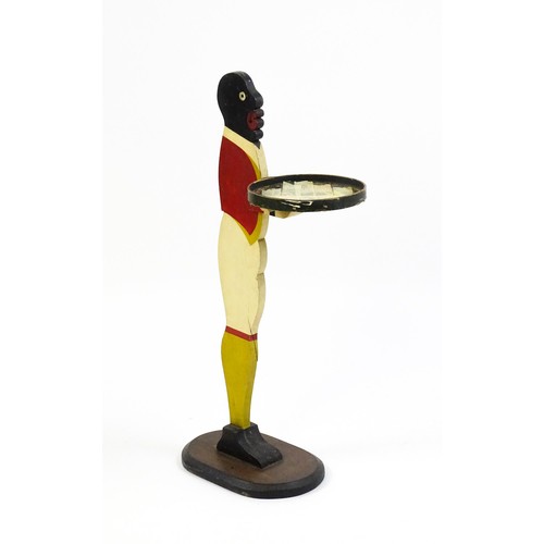 1610 - A 20thC blackamoor dumb waiter with painted polychrome decoration. Approx. 35