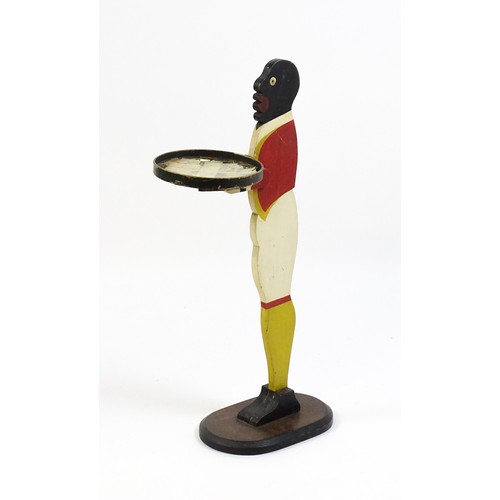 1610 - A 20thC blackamoor dumb waiter with painted polychrome decoration. Approx. 35