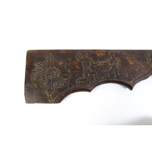 1678 - An 18th / 19thC carved beam / door pediment / frieze of shaped form with naive / folk art decoration... 