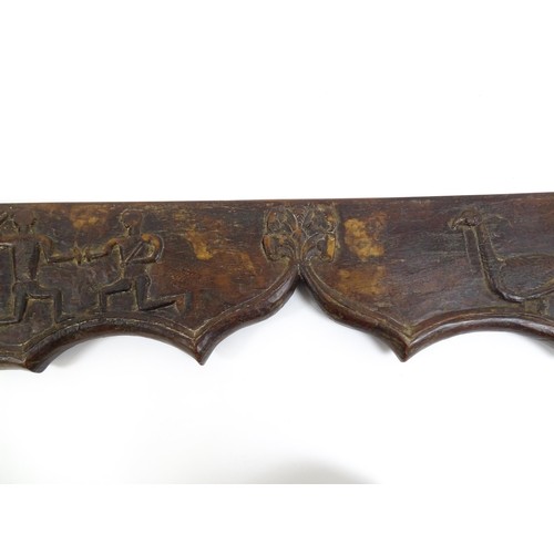 1678 - An 18th / 19thC carved beam / door pediment / frieze of shaped form with naive / folk art decoration... 