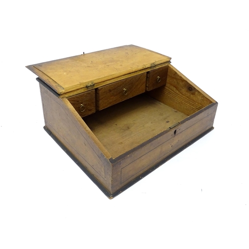 1280A - A Victorian oak writing slope / correspondence box opening to reveal three drawers within. Approx. 6... 