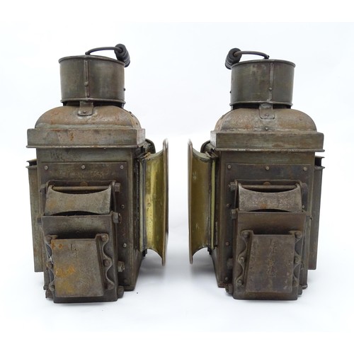 1289 - A pair of late 19thC railway / ship lanterns / lamps, each with two glass panels, a bracket to one s... 