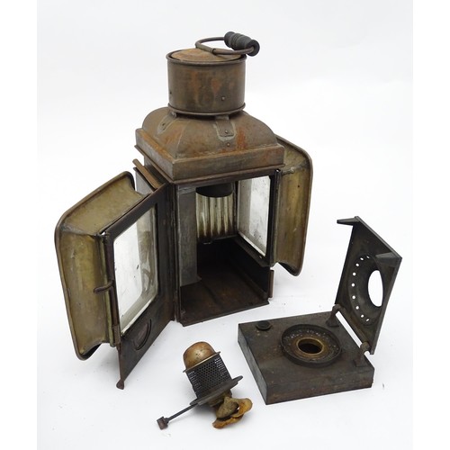 1289 - A pair of late 19thC railway / ship lanterns / lamps, each with two glass panels, a bracket to one s... 