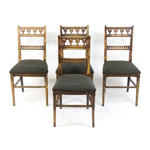 1564A - Four 19thC Gothic side chairs, the top rails having large pierced trefoil decoration and the mid rai... 