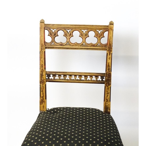 1564A - Four 19thC Gothic side chairs, the top rails having large pierced trefoil decoration and the mid rai... 