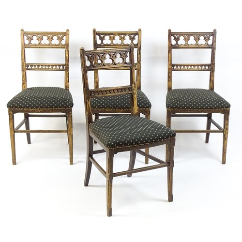 1564A - Four 19thC Gothic side chairs, the top rails having large pierced trefoil decoration and the mid rai... 