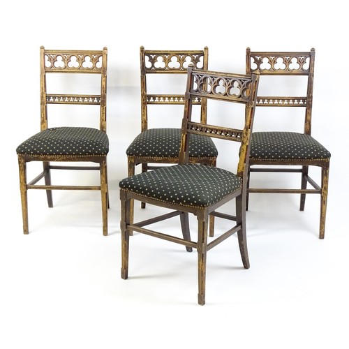 1564A - Four 19thC Gothic side chairs, the top rails having large pierced trefoil decoration and the mid rai... 