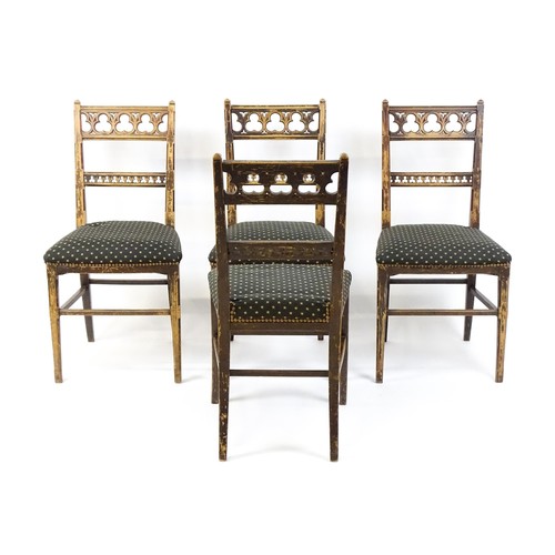 1564A - Four 19thC Gothic side chairs, the top rails having large pierced trefoil decoration and the mid rai... 