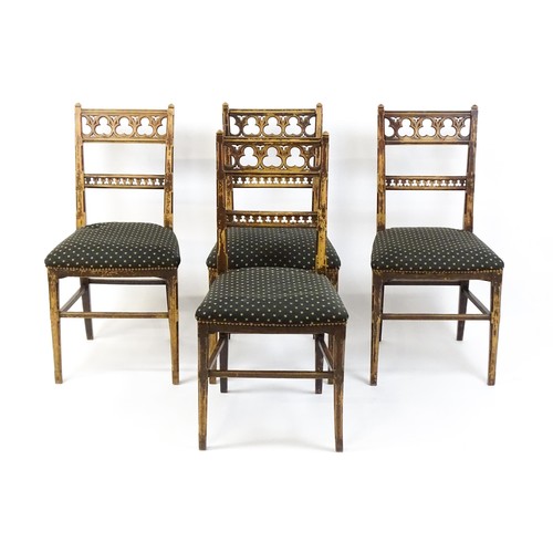 1564A - Four 19thC Gothic side chairs, the top rails having large pierced trefoil decoration and the mid rai... 