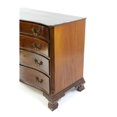 1674 - A c.1760 serpentine fronted mahogany chest of drawers with four long graduated drawers raised on oge... 