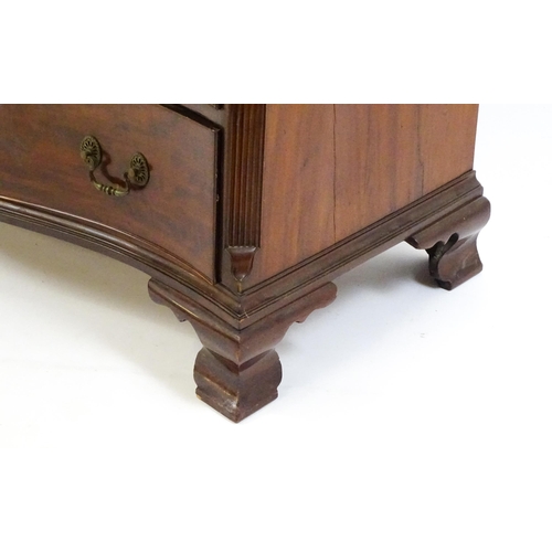 1674 - A c.1760 serpentine fronted mahogany chest of drawers with four long graduated drawers raised on oge... 