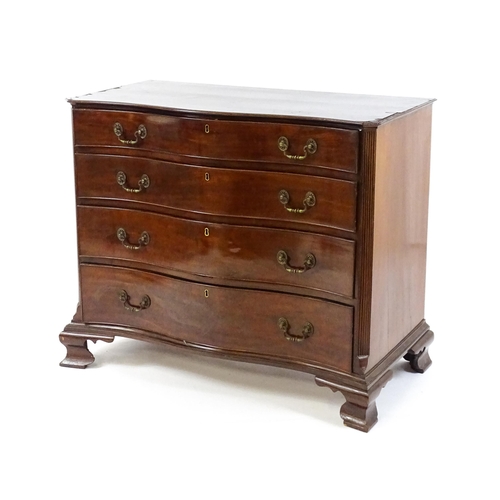 1674 - A c.1760 serpentine fronted mahogany chest of drawers with four long graduated drawers raised on oge... 