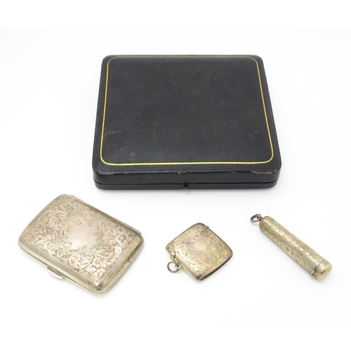 629 - A silver cigarette case and vesta case with engraved acanthus decoration, hallmarked Birmingham 1906... 