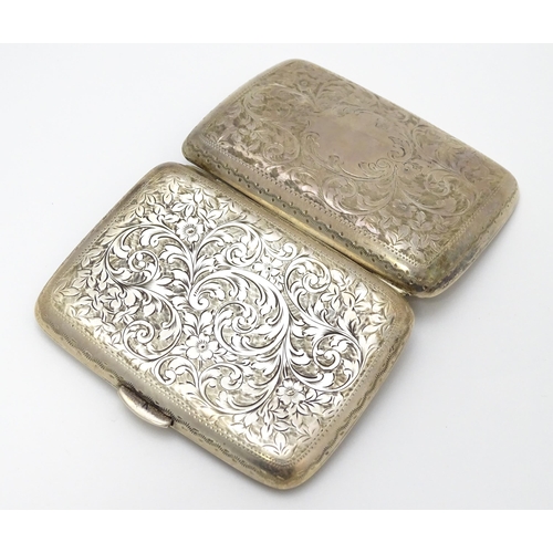 629 - A silver cigarette case and vesta case with engraved acanthus decoration, hallmarked Birmingham 1906... 