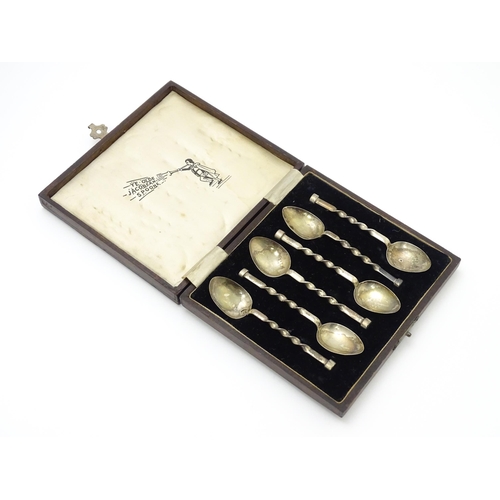 630 - A cased set of six silver teaspoons with twist decoration hallmarked Birmingham 1926, maker Robert P... 