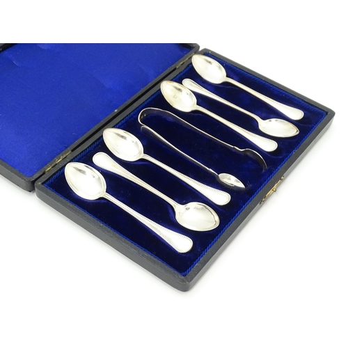 637 - A cased set of six silver teaspoons with sugar tongs en suite, hallmarked Birmingham 1905, maker Wil... 