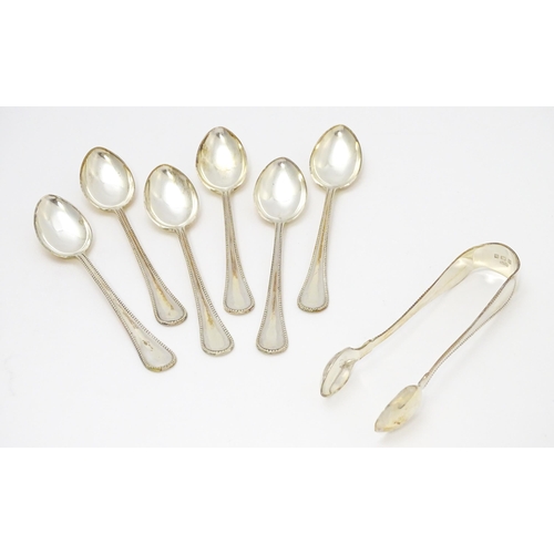 637 - A cased set of six silver teaspoons with sugar tongs en suite, hallmarked Birmingham 1905, maker Wil... 