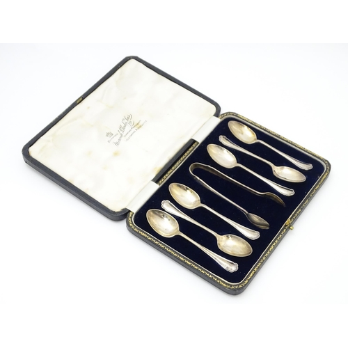 638 - A cased set of six silver teaspoons with sugar tongs en suite, hallmarked Sheffield 1922, maker Mano... 