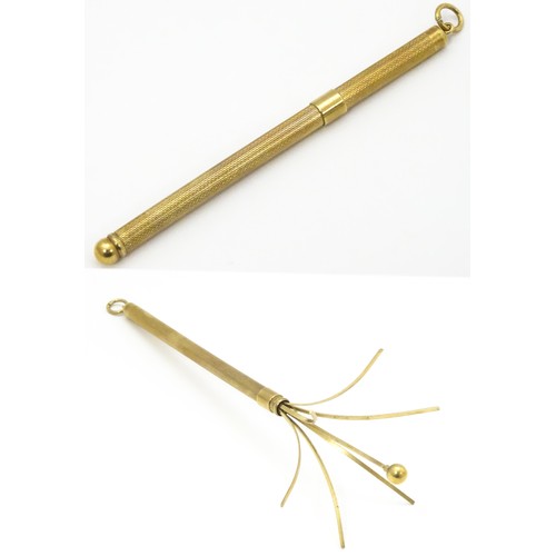 952 - A 9ct gold swizzle stick / cocktail stirrer hallmarked Birmingham 1982, maker William Manton. Approx... 