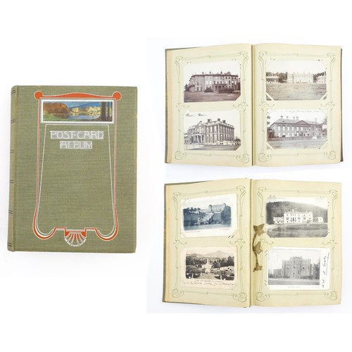 2139 - A 20thC postcard album to include various Royal residences, country houses and palaces to include Wi... 