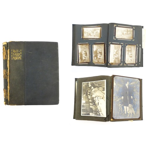 2141 - An early 20thC photograph and postcard album containing various South American scenes to include Esp... 