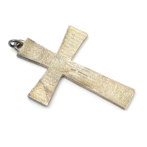 882 - A large silver pendant cross, hallmarked Birmingham 1973 maker AJH. Approx 3