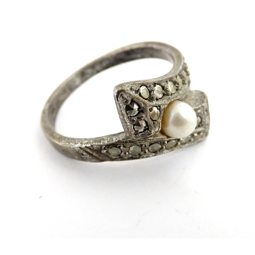 910A - A quantity of assorted jewellery comprising a Continental silver ring with filigree decoration, a wh... 