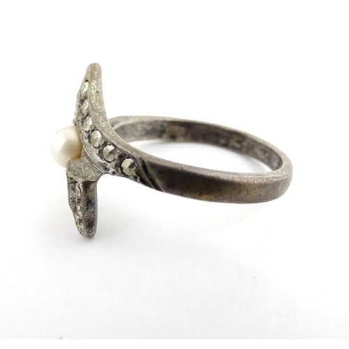 910A - A quantity of assorted jewellery comprising a Continental silver ring with filigree decoration, a wh... 