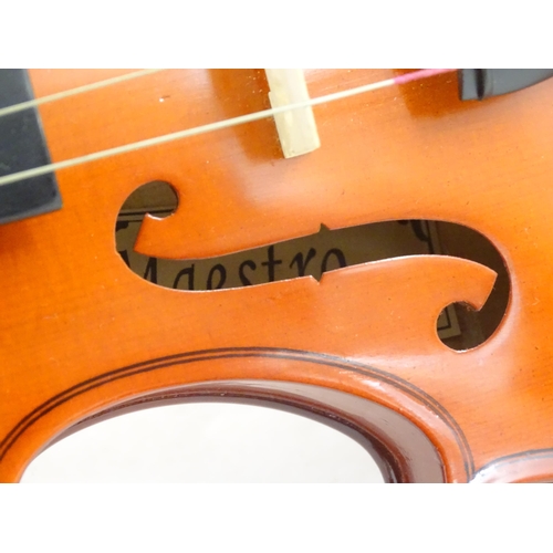 19 - Musical Instrument: a student's 1/2 size 'Maestro' violin, in a fitted hard case, approx 18 1/2