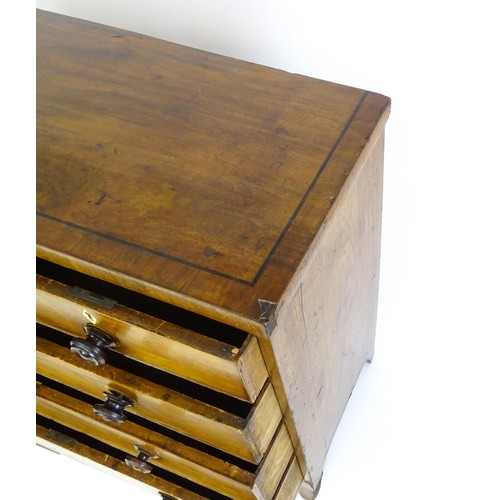 27 - A 19thC mahogany chest of drawers comprising two short over three long drawers with turned knob hand... 