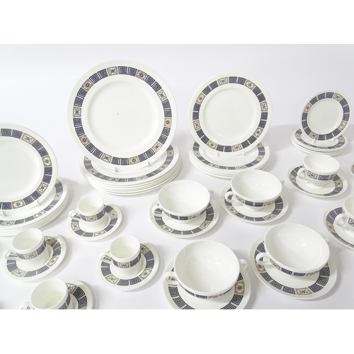 74 - A quantity of Wedgwood dinner wares in the Asia pattern to include plates, twin handled soup bowls, ... 