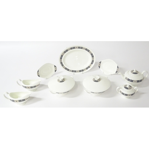 74 - A quantity of Wedgwood dinner wares in the Asia pattern to include plates, twin handled soup bowls, ... 