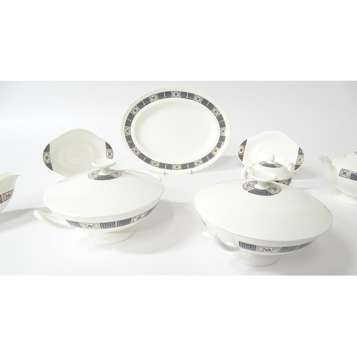 74 - A quantity of Wedgwood dinner wares in the Asia pattern to include plates, twin handled soup bowls, ... 